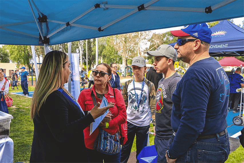Field representative engaging with the community